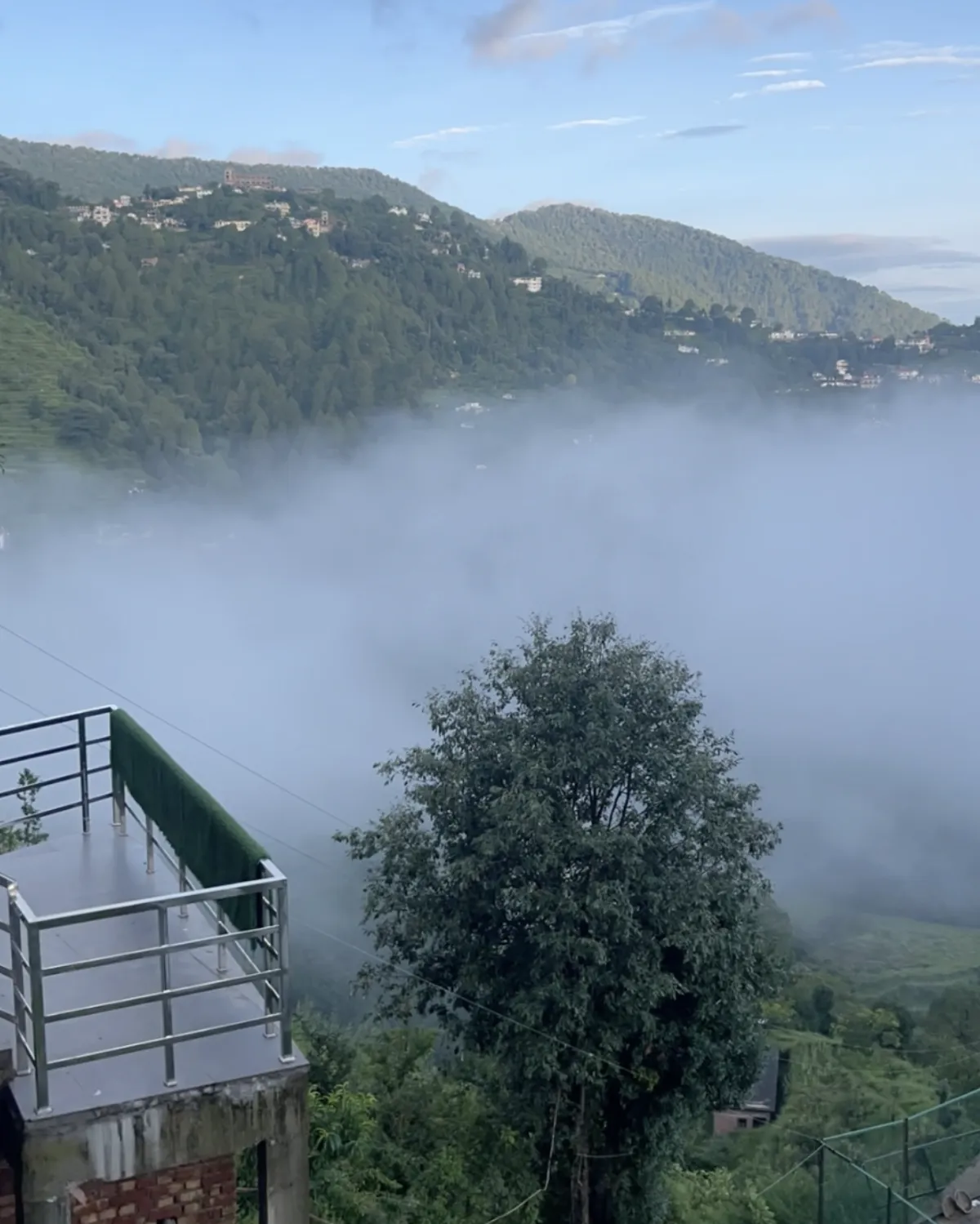 Clouds coming over the terrace railing, Hotel Cloud Inn, Ramgarh, Nainital (1 of 2)