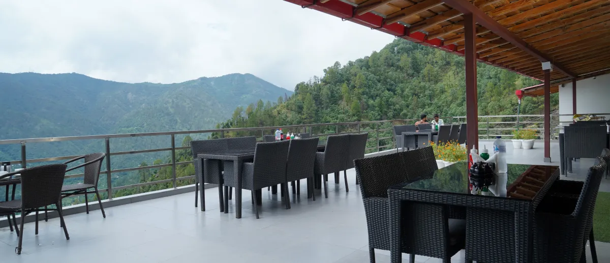 Open rooftop terrace, tables set, Hotel Cloud Inn, Ramgarh, Nainital (2 of 4)