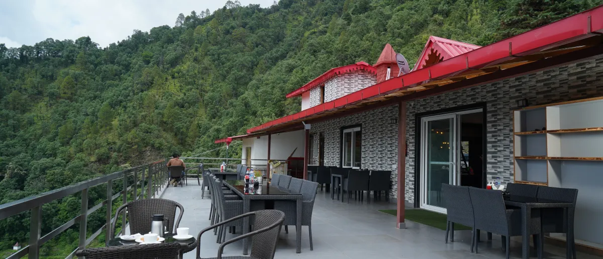 Open rooftop terrace, tables set, Hotel Cloud Inn, Ramgarh, Nainital (3 of 4)